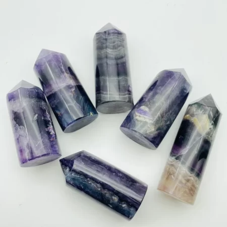 purple fluorite round tower point wholesale wholesale crystals 356869 720x